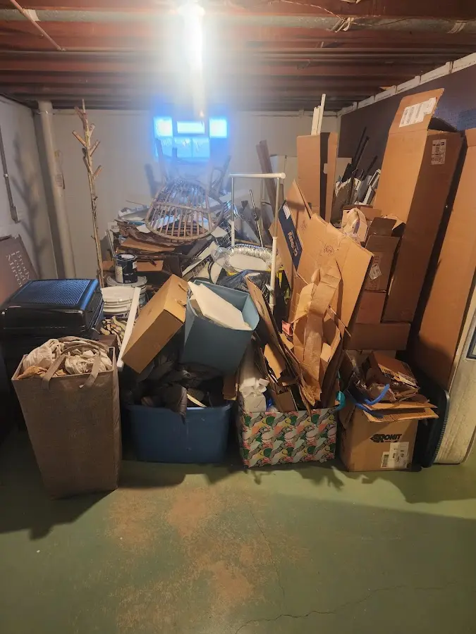 Roll-off dumpster container at job site for 15 Yard Dumpster Rental in Fort Lee